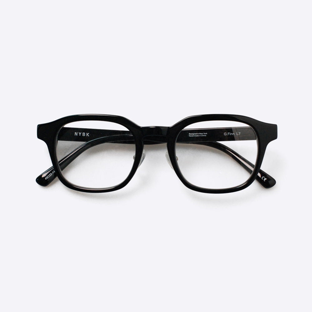 A pair of black, acetate NYBK Eyewear G.Finn L7 glasses with a minimalist design.