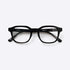 A pair of black, acetate NYBK Eyewear G.Finn L7 glasses with a minimalist design.